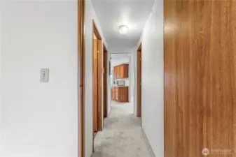 A view from the back bedroom toward the kitchen.