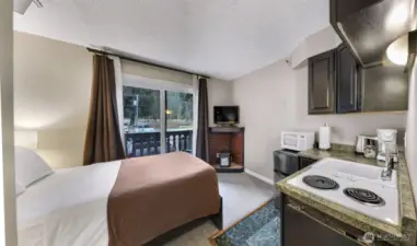 Everything you need for a night on the mountain - queen bed, kitchenette and private balcony