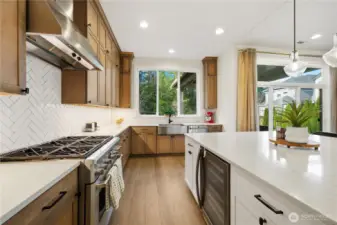 Stainless premium GE appliances including six burner gas stove