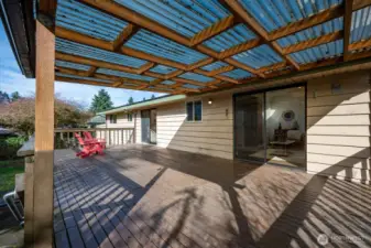 Partially covered expansive deck off the dining room and kitchen.