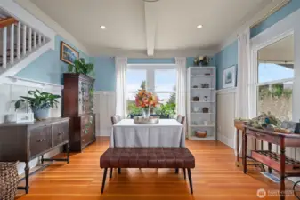Dining room with wainscoting and plate/picture rails. Clear Fir flooring.