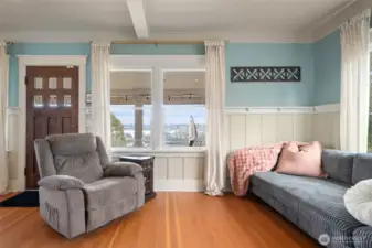 Living room with breathtaking views. Original front door leads to secluded covered porch.