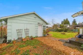 Detached 400 sf garage. It is partially finished with electric and plumbing!  Bring your creativity and make this a hobby room, second living room, or guest suite!