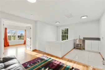 Landing Between Bedroom Suite #2 & Bedroom #5: Offers Lounge Area, With Laundry Room and Utility Sink.