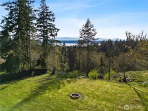 Backyard With Firepit and Entertaining in Mind.