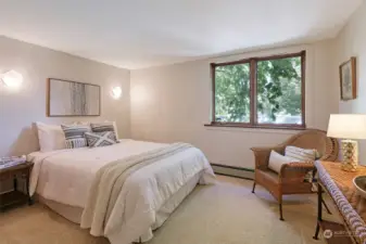 4th bedroom on lower level overlooking lush rear gardens and Koi Pond, carpeted and freshly painted Benjamin Moore White Dove.
