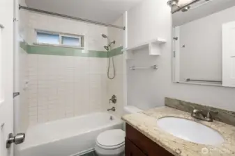 The upper level full bath.