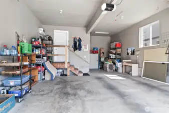 two car garage with additional storage space