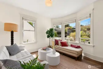 Lovely bay window.  Ceilings over 9 feet on main floor!