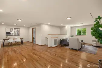 Head upstairs to the large bonus area with hardwood floors
