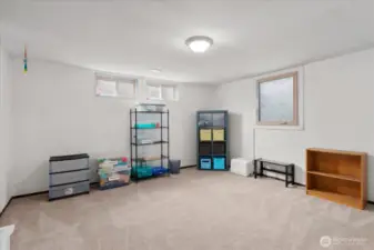 Oversized bedroom with multiple windows
