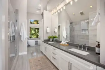 Gleaming updated primary bath is a spa retreat