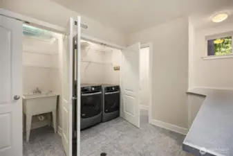Laundry area and half bath on lower level