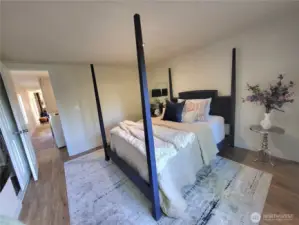 main bedroom queen sized bed.