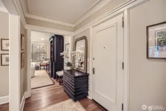 formal entry offers a grand arrival room to drop keys hang coat and fell as if you have stepped in to a penthouse style arrival
