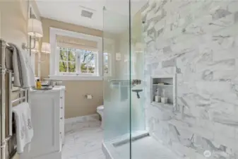 remodeled to a timeless design, full height marble surround - rain shower head- frameless over sized glass shower with lovely patterned marble floor