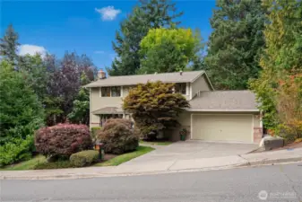 Welcome to 15240! Enter through garage or front door via lush garden pathway.
