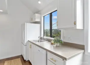 The kitchen has been updated along with new range and dishwasher installed in August 2025.