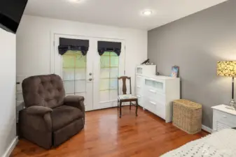French doors lead to the front deck