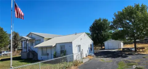 Detached 2 car garage in back with ADU entrances on left