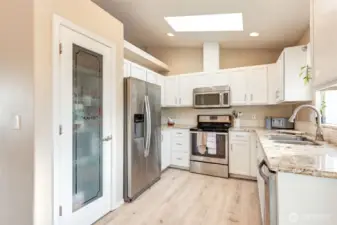 Sunny and bright kitchen with pantry!