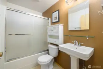 Full bath in main hallway...