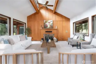 Soaring ceilings and a statement fireplace to create a warm inviting living space.