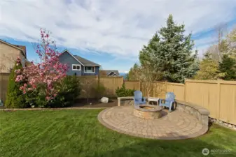 Custom Firepit with lighted bench seating.
