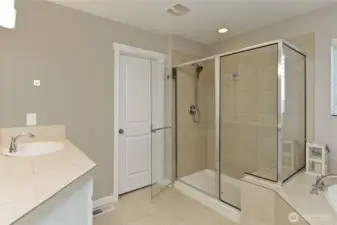 Primary Bath with Soaking tub and separate Shower, Spacious Walk-in Closet with California Closets