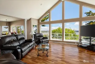 The living room exudes comfort all while maximizing the views.