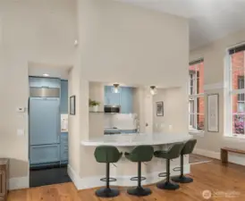 Stainless steel appliances complete with Sub Zero fridge.