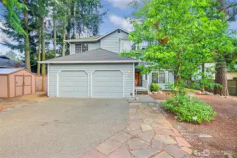 Beautifully landscaped spacious home in Haller Lake Community.