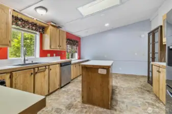 Kitchen with vaulted ceilings