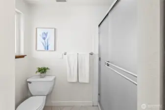 In addition to the soaking tub, there's a large shower in this bath.
