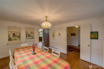 Formal dining room with access to the main entry, dining room and kitchen.