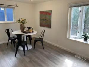 The dining room is large enough for many options. A larger dining table, add a desk or sitting area. The bay windows looking out over the front yard is a great place to start your garden seeds in the spring.
