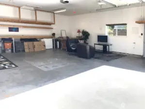 Inside the detached garage with long work bench and tons of storage. Need a place to keep a prized vehicle? In home business? An art studio? A detached play room? With all this space you have many options.