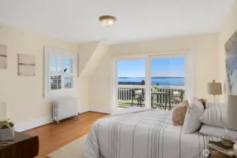 Upstairs bedroom with private deck &  walk-in closet