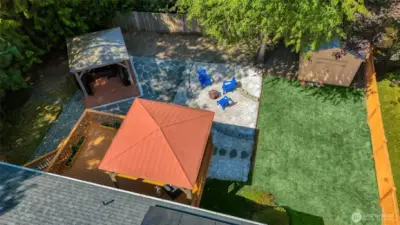 view of back yard and both gazebos