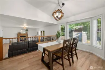 From the wonderful dining perfect for hosting, step down into the family room.