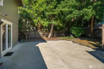 Spacious back patio is great to set up the grill or patio furniture!