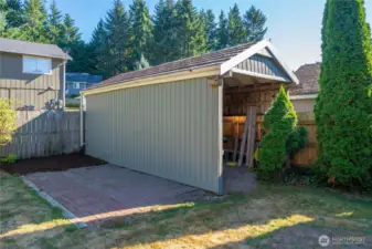 Oversized shed is huge and great to store toys, yard tools, you name it!