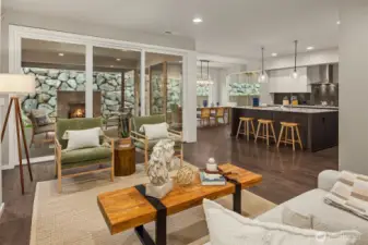 This view shows the open kitchen and dining room with yet another sliding door to the patio.
