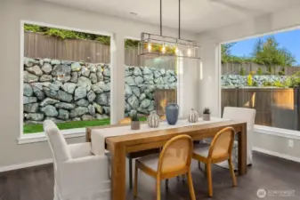 Dining room looks out to the fenced, private back yard.