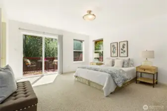 Main floor bedroom faces south to private deck and Kelsey greenbelt