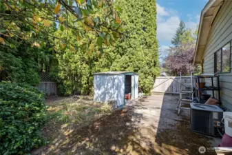 Concrete slab besides the garage could be RV parking or whatever you need it to be.