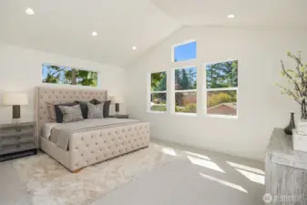 Designer primary suite with five-piece bath with heated floors