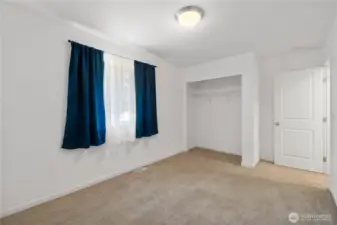 3rd Bedroom with window out to backyard.