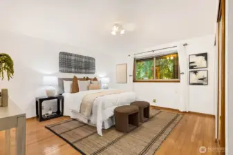 Large primary bedroom located on this main floor, plenty of room in the closets, hardwood floors