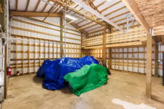 The shop is large, complete with an RV bay.  Well lit, well built, plenty of space here